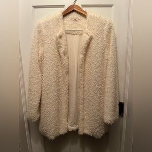 Faux Fur Soft Over Jacket Fuzzy with hidden button closure. Size M